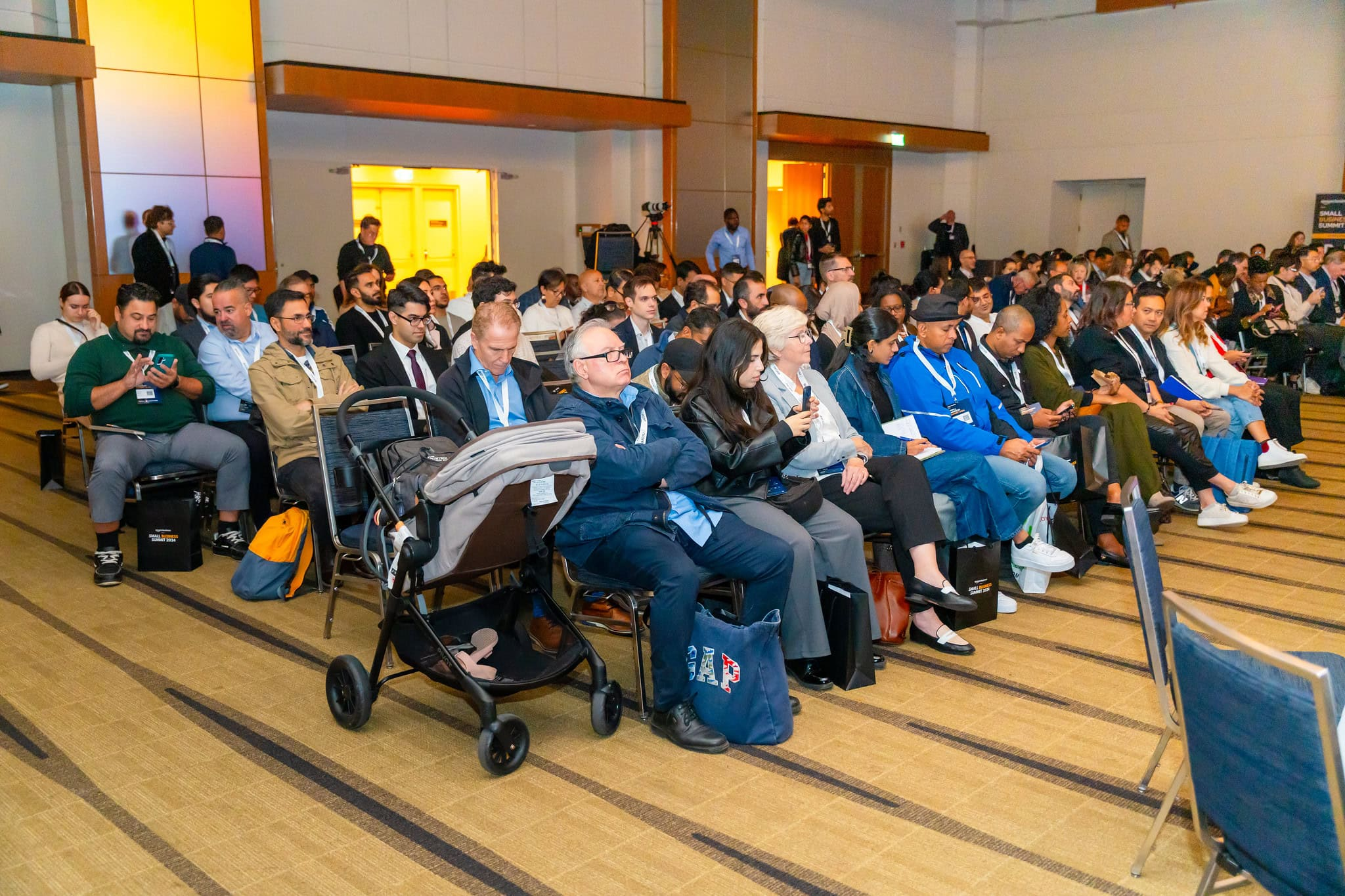 Attendees filling every row of the Show session hall
